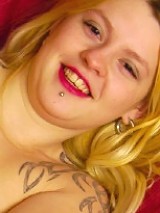 Young fatty with golden hair inserts in her pussy dildo